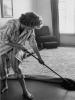 Young-Woman-Attending-to-Her-Housework.jpg